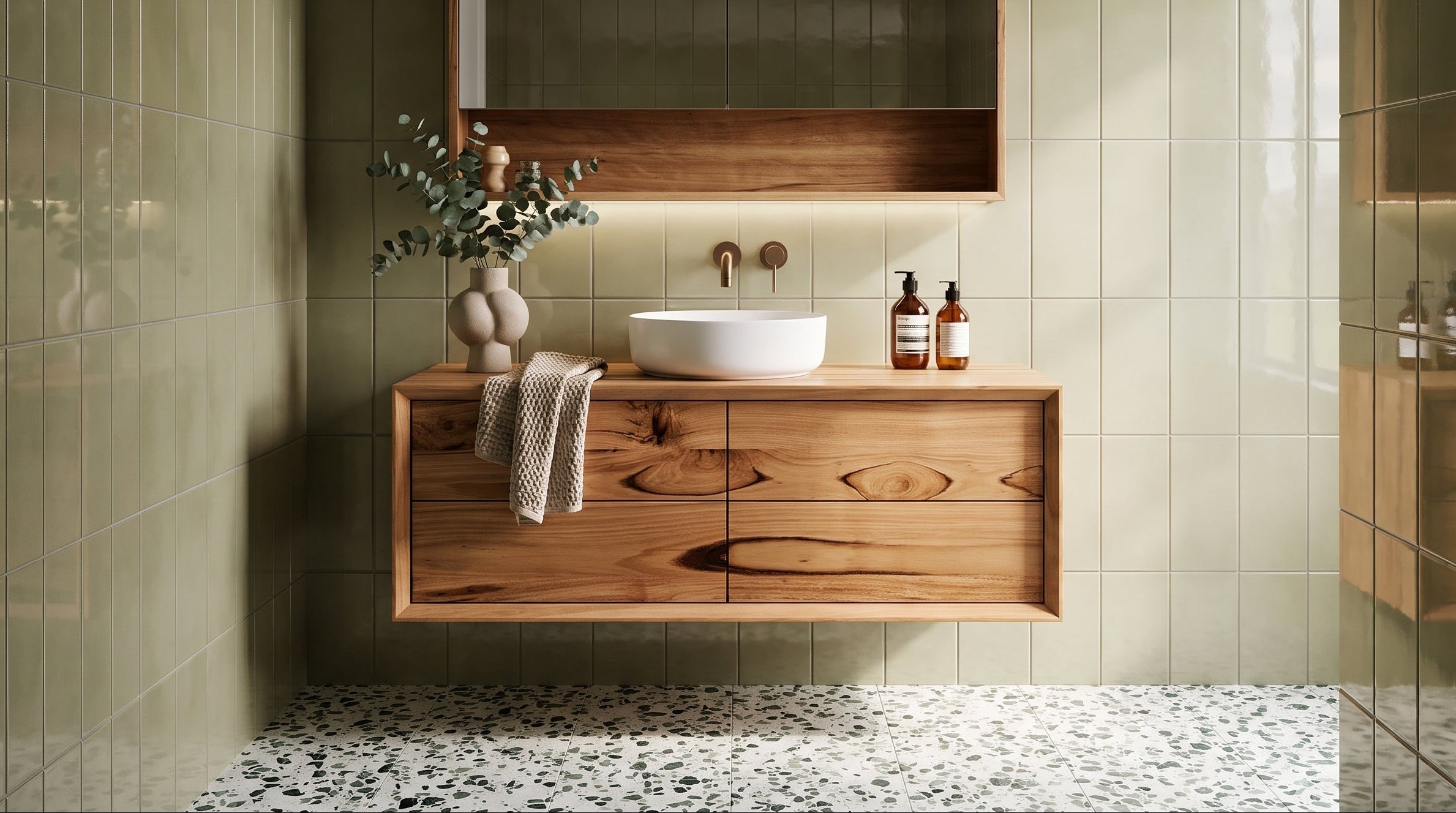 Bathroom with wooden vanity, sink, and decorative elements.